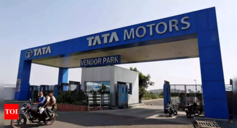 Tata Motors surges on demerger, IIFL dives 20%